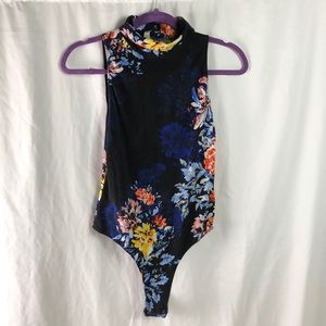 Free people black floral body suit medium